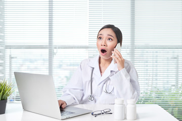 woman medical staff calling coworker nurse to ask problem of patient.