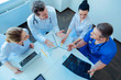 © zinkevych - Top view picture of competent doctors that working together