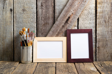 picture frame blank paper and paintbrushes at tin can