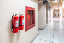 Fire Extinguisher System On The Wall Background, Powerful Emergency Equipment For Industrial