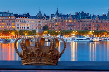 Wall Mural - Stockholm. City embankment at sunset.