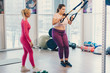 © MZaitsev - Female fitness trainer coaching her fat client