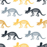Fototapeta Dinusie - Dinosaur skeleton and fossils. Vector seamless pattern. Original design with triceratops. Print for T-shirts, textiles, web. White background.