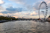 Fototapeta Londyn - London Eye (Millenium wheel) and Thames river at sunset, London, UK