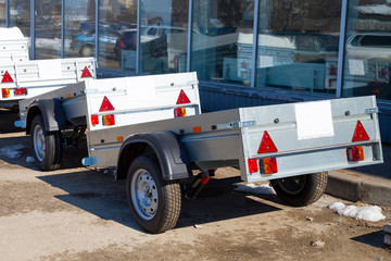 Open car trailer,ow; cargo; car trailer; trailer truck; tow bar.