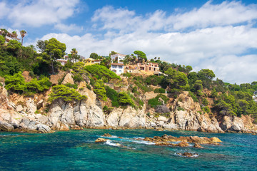 Wall Mural - Beautiful villa on high rock on sea shore of spanish coast in Costa Brava, Spain