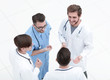 © ASDF - view from the top. team of doctors discussing the problems