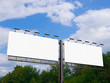 © pabijan - 3D rendering of blank billboard (empty advertisement) with city background. Empty mockup template