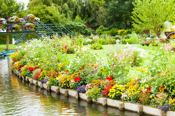 floating gardens very flowery in the spring between the canals, Hortillonnages in Amiens in France