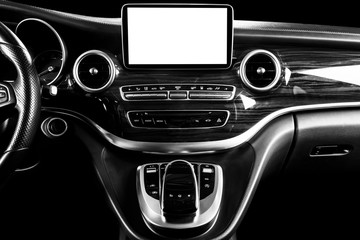 Monitor in car with isolated blank screen use for navigation maps and GPS. Isolated on white with clipping path. Car detailing. Modern car interior details. Black and white