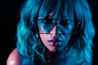 © kohanova1991 - Charming unusual girl with blue hairstyle and glasses. Sexy woman with perfect makeup and wig looking at camera and smiling. Glamour, fashion concept.