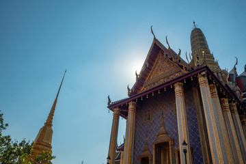 Beautiful main hall of wat phra kaew the royal temple in the grand palace on clear blue sky background