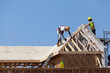 © COSPV - Carpenters are working on the house roof at construction