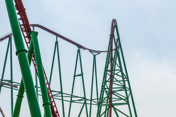 Roller Coaster loops in the sunset.