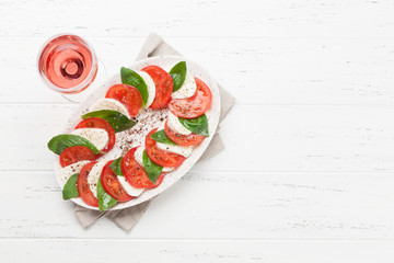 Sticker - Delicious italian caprese salad and wine glass