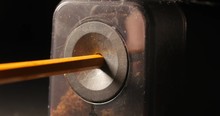 Pencil Being Sharpened In A Pencil Sharpener