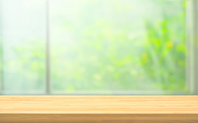 Wall Mural - Wood table top on blur of window with garden flower background in morning