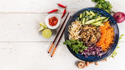 Wall Mural - Top view composition of vietnamese food in bowl