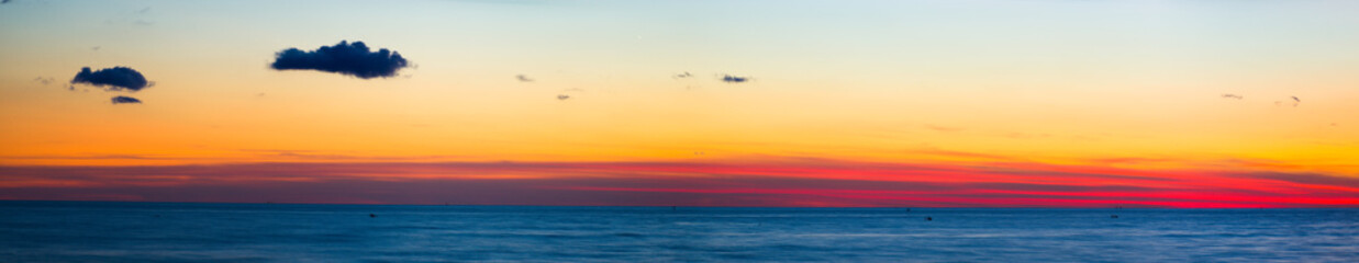 Beach in Tuscany,Lido di Camaiore's new pier at sunset. Italy.