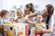 © Oksana Kuzmina - Kids play with educational toy in nursery