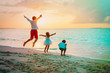 © nadezhda1906 - happy father wither daughter and son play on beach