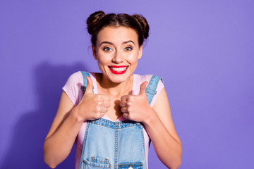 Sticker - Close up photo beautiful funny she her lady two buns hands arms hold thumbs up advising red lipstick pomade wear casual t-shirt jeans denim overalls clothes isolated purple violet background