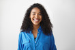 © shurkin_son - Human facial expressions, emotions, feelings and reaction. Portrait of happy joyful young mixed race woman with perfect glowing skin and charming smile enjoying good day, posing in white studio