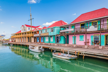 Fototapete - St John's, Antigua. Colorful buildings at the cruise port.