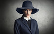 © spaxiax - fashionable woman is wearing blue hat and jacket