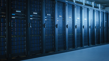 Wall Mural - Shot of Modern Data Center With Multiple Rows of Fully Operational Server Racks. Modern High-Tech Telecommunications Database Super Computer in a Room.