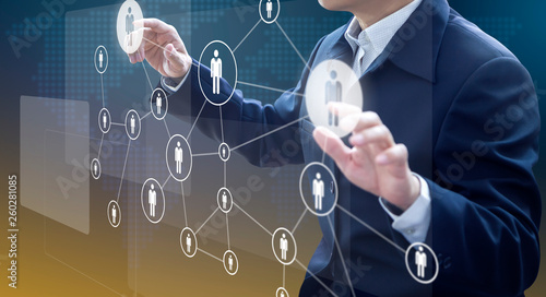 Fotografía Business administrator in action of manpower or human resource planning or business organisation on a virtual dashboard