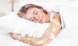 © BillionPhotos.com - Young woman  sleeping on the white linen in bed at home