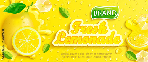Fotografía Fresh lemonade with lemon, splash, apteitic drops from condensation, fruit slice, ice cubes on gradient yellow background for brand,logo, template,label,emblem and store,packaging,advertising