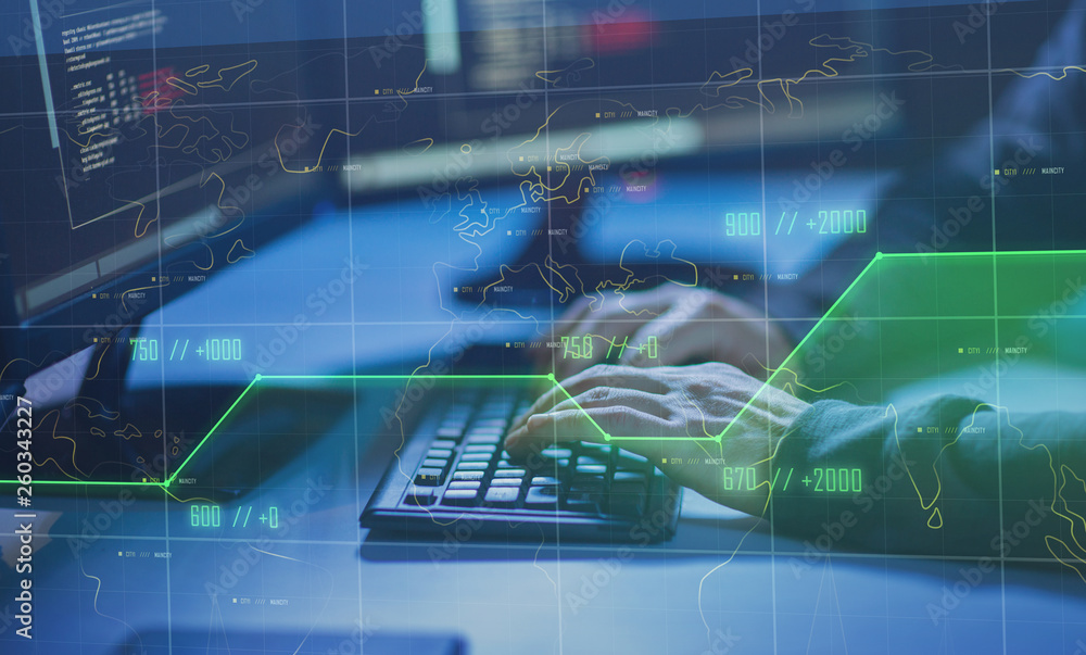 cybercrime, hacking and technology concept - hands of hacker in dark ...