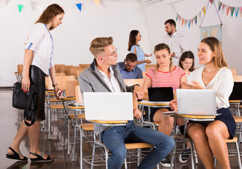 Wall Mural - Students communicating during recess