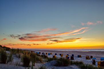 Wall Mural - Sunset at the beach on the East Frisian Island Juist in the North Sea, Germany.