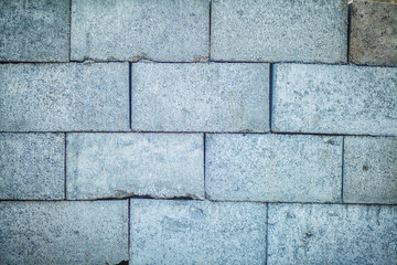 Concrete block wall texture and background seamless. Stack of cement blocks at the construction site. cinder blocks background.