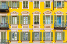Nice In France, Colorful Facade, With Typical Murals Windows And Green Shutters, Place Garibaldi, Detail 