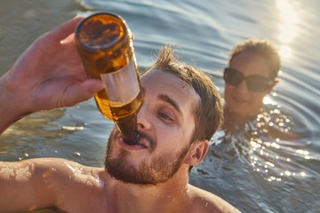 Summer beach fun drinking beer