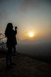 © Manu Holla - Silthouse of a girl playing during sunrise at Bisle Ghat, KA India