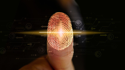 businessman login with fingerprint scanning technology. security system concept