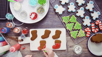 Poster - Flat lay. Step by step. Decorating gingerbread and sugar cookies with royal icing for Christmas.