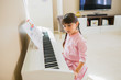 © ipek - Girl playing piano