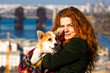 © fotodaocomua - young woman with welsh corgi puppy