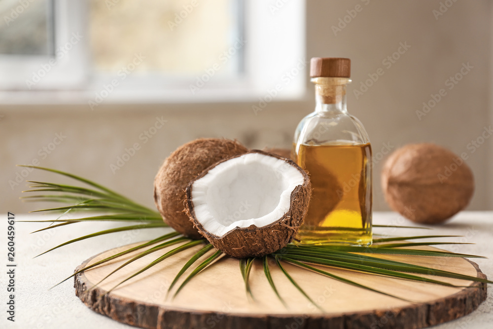Composition with coconut oil on table