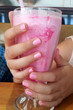 Pink nails to match the pink milkshake