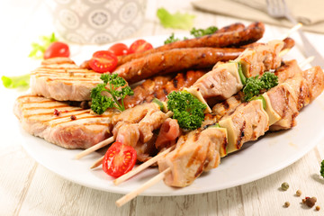 Poster - grilled sausage, pork chop and beef skewer with salad and sauce