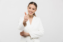 Beautiful Happy Woman Posing Isolated Over White Wall Background Showing Thumbs Up.