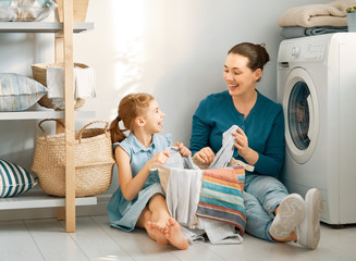 Wall Mural - family doing laundry