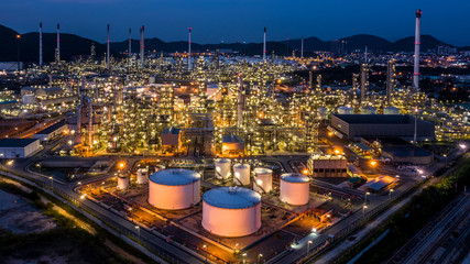 Aerial view oil refinery plant factory at twilight.